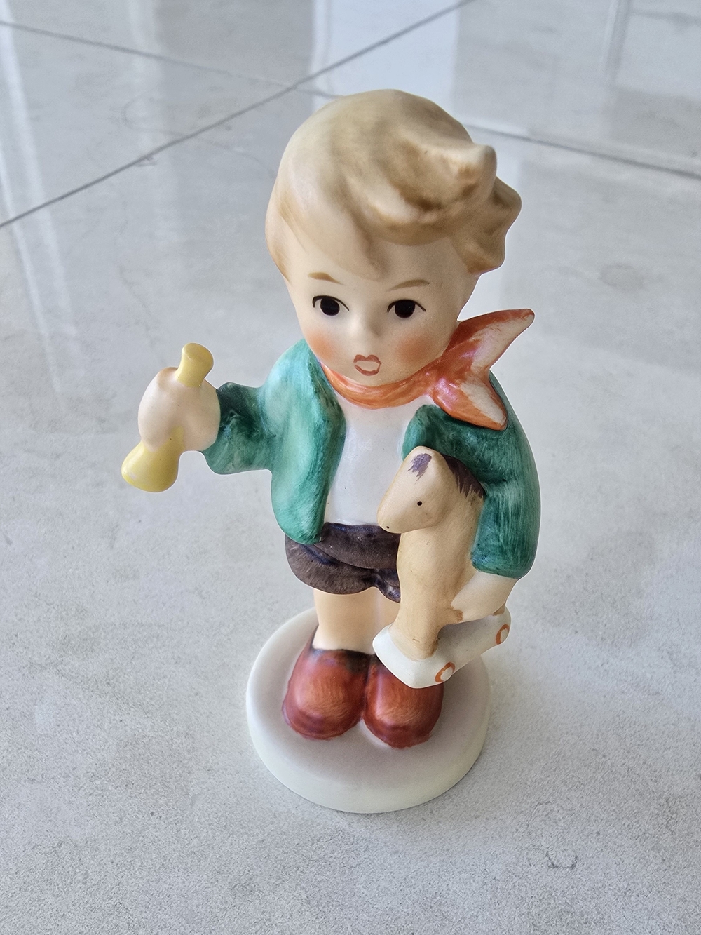 Hummel 'Boy With Horse' Figurine - In a Teal Jacket and Orange Scarf
